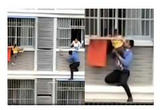 女童头部被卡防盗栏，邻居翻窗徒手攀爬外墙解救